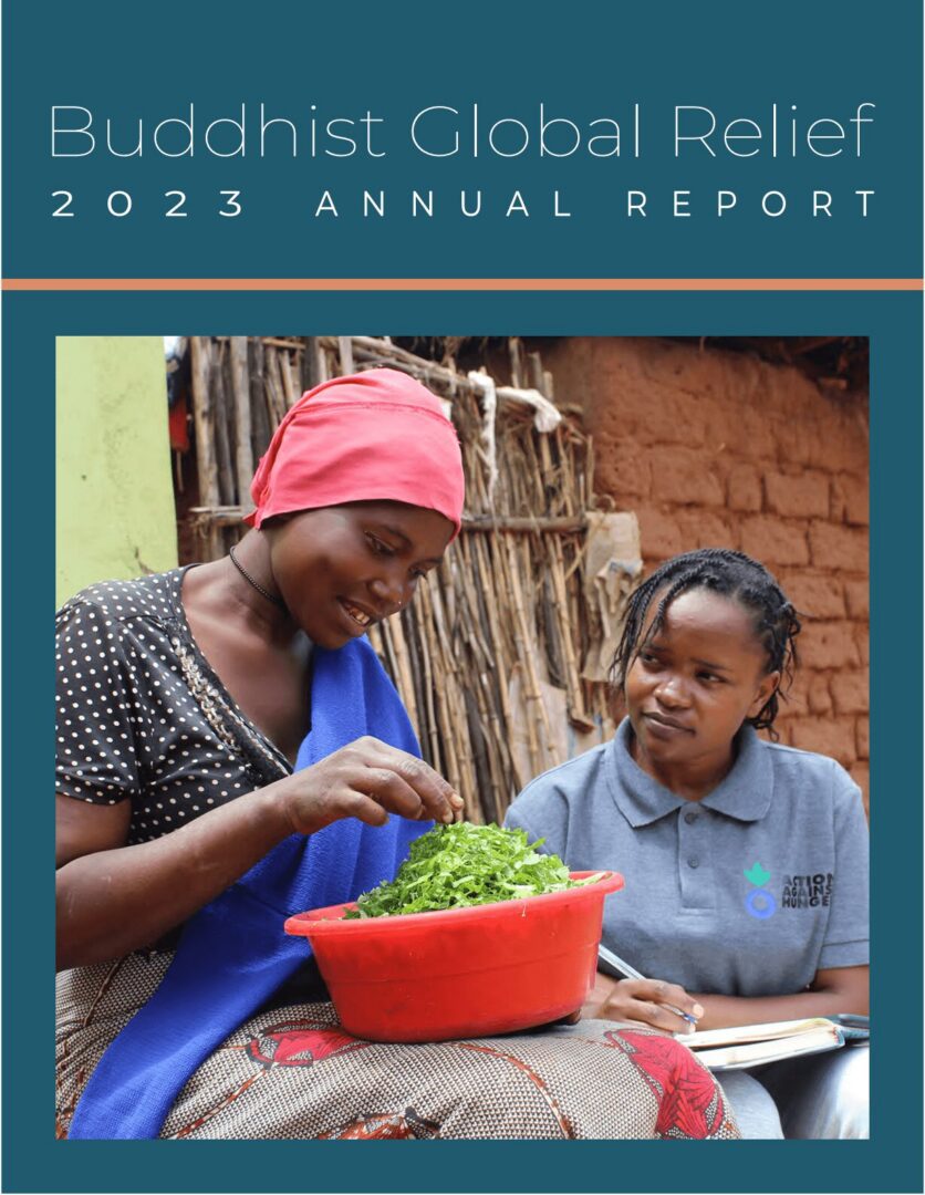 Cover of the 2023 Buddhist Global Relief annual report with a woman and child preparing food.